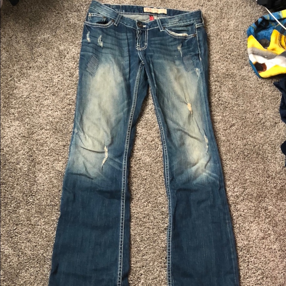 Women’s buckle jeans